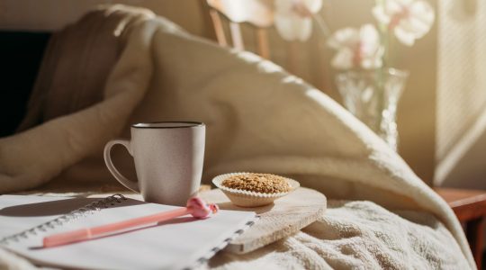 Coffee, note pad, and breakfast cookies